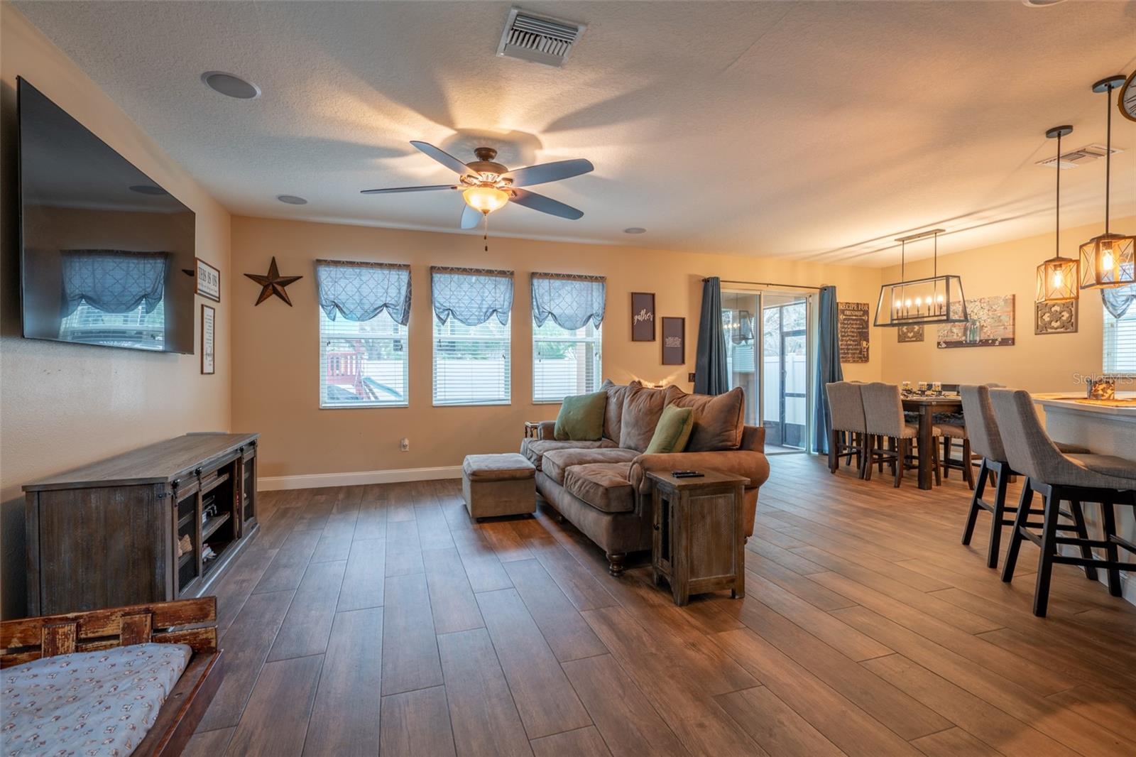 SPACIOUS LR, DINING, KITCHEN ALL COMPLETE WITH WOOD LOOK TILE