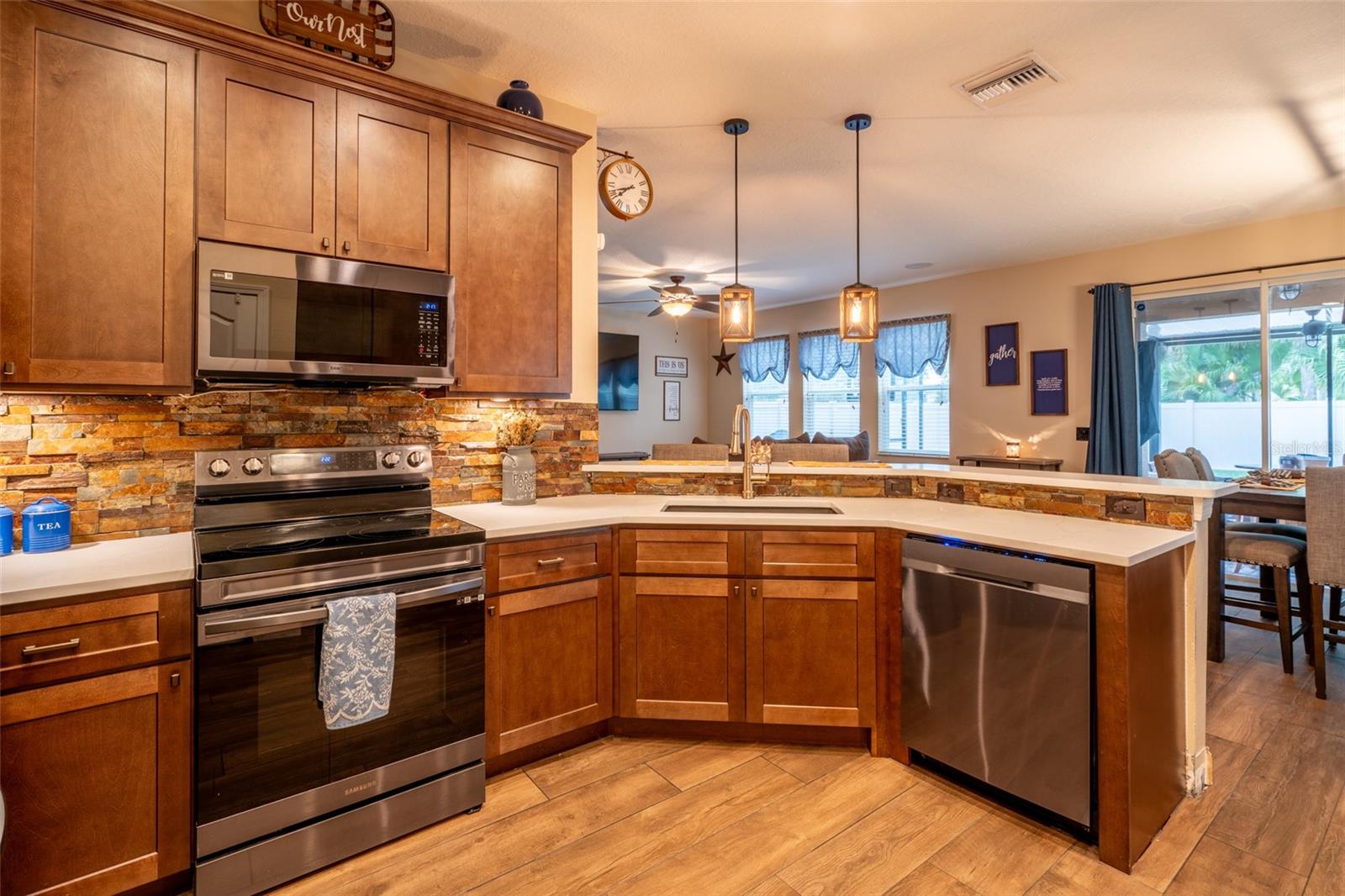 BREAKFAST BAR WITH PENDANT LIGHTS, SEATING FOR 4