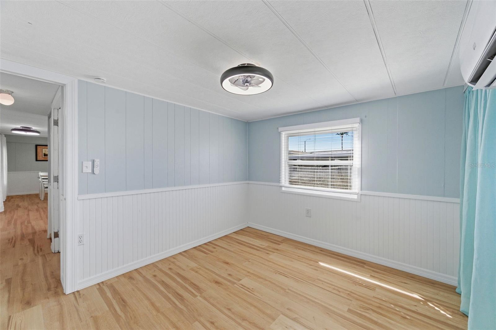 Second bedroom situated in rear of home for a split plan