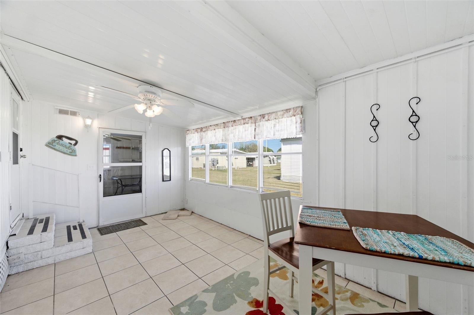 Tiled floor for extra enclosed side family room