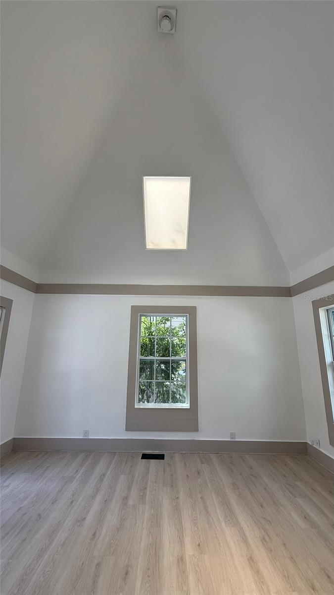 Vaulted Ceiling with Skylight in Master Suite.