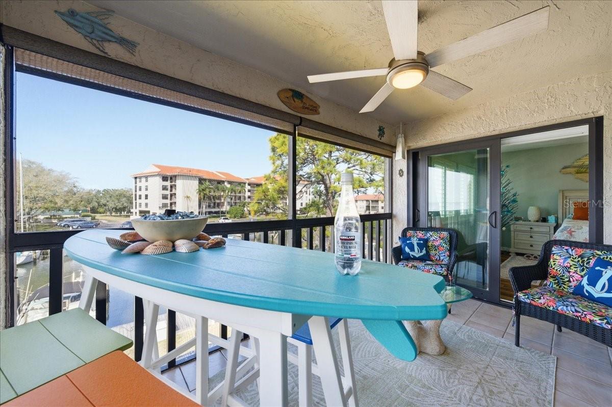 The spacious bumped-out balcony upgrades include tile floors, a decorative ceiling fan and roll down shades for comfort, and elevated second floor views of the marina and Saint Joseph Sound/Gulf of Mexico.  A truly ideal space to relax and enjoy enviable sunsets in the evenings and watch the boats come in and out and the birds and marine wildlife pass by during the day.