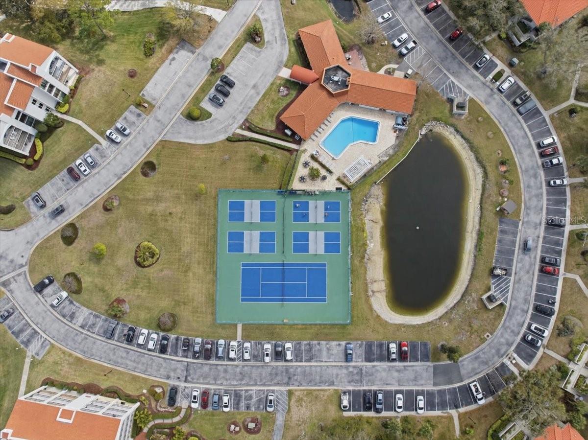 Tarpon Cove’s resort-style amenities include: two pools and spa, tennis courts, exercise facility, putting green, fishing pier, Kayak storage & launch, recreational clubhouse, waterfront nature walking trail, grill and picnic areas, and a private deep water channel with  direct gulf access - no bridges!