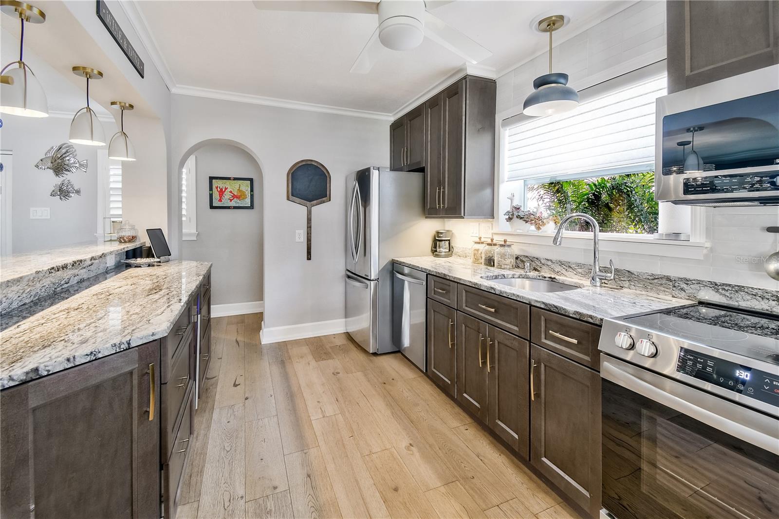 Kitchen with bar area to dining