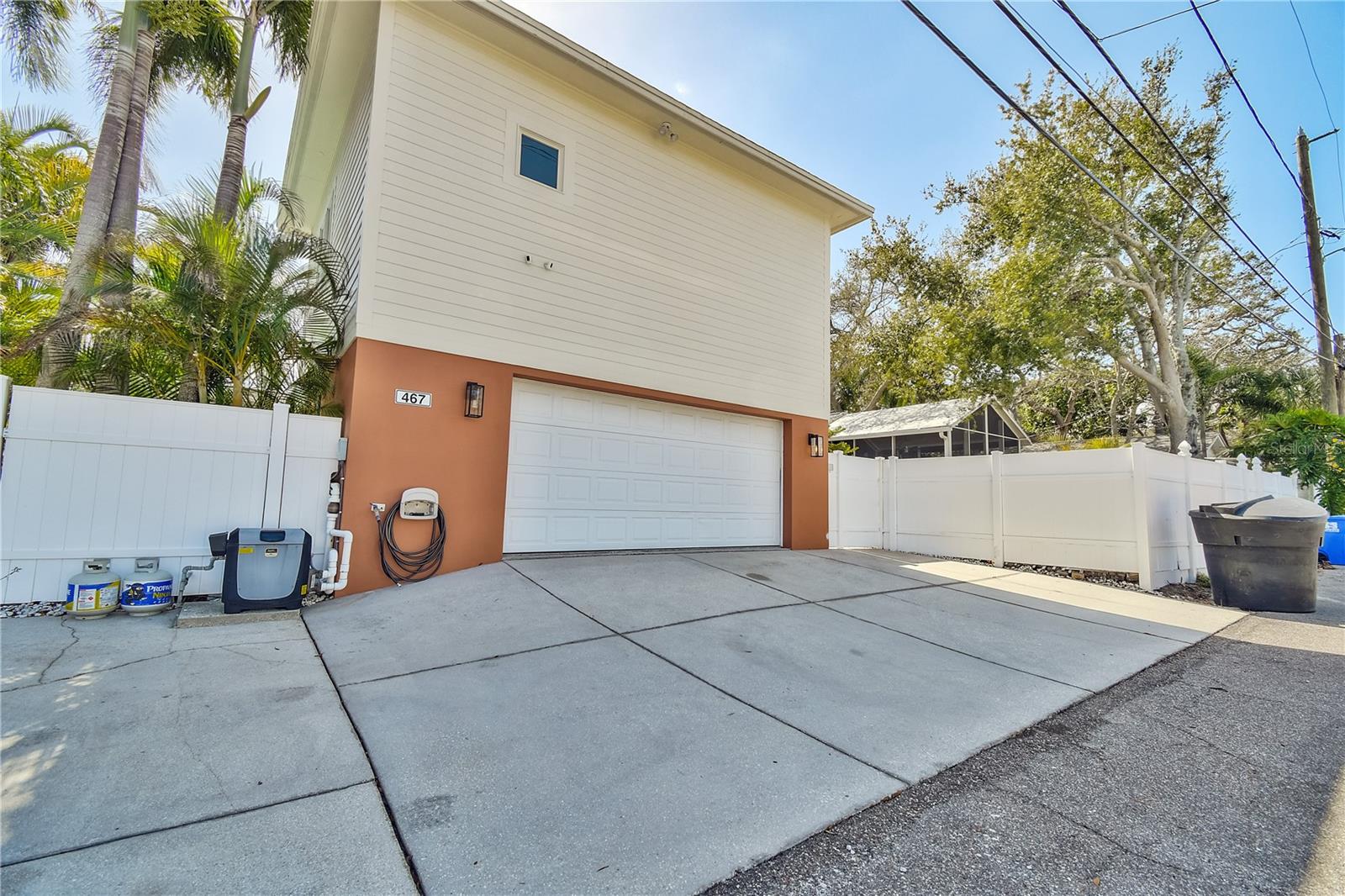 528 sq. ft. garage with expansive parking pad large enough for 23" boat