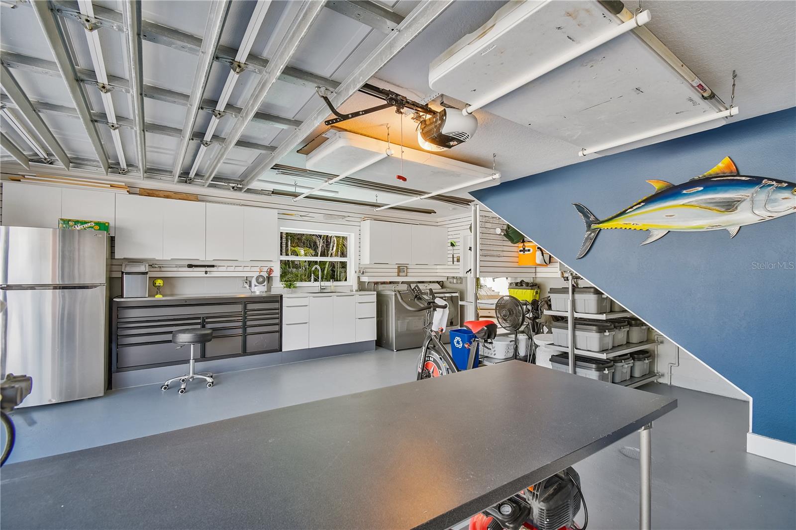 528 sq. ft. garage w/refrig/freezer, tool storage, workbench, sink with large window, Maytag Bravos XL washer-dryer