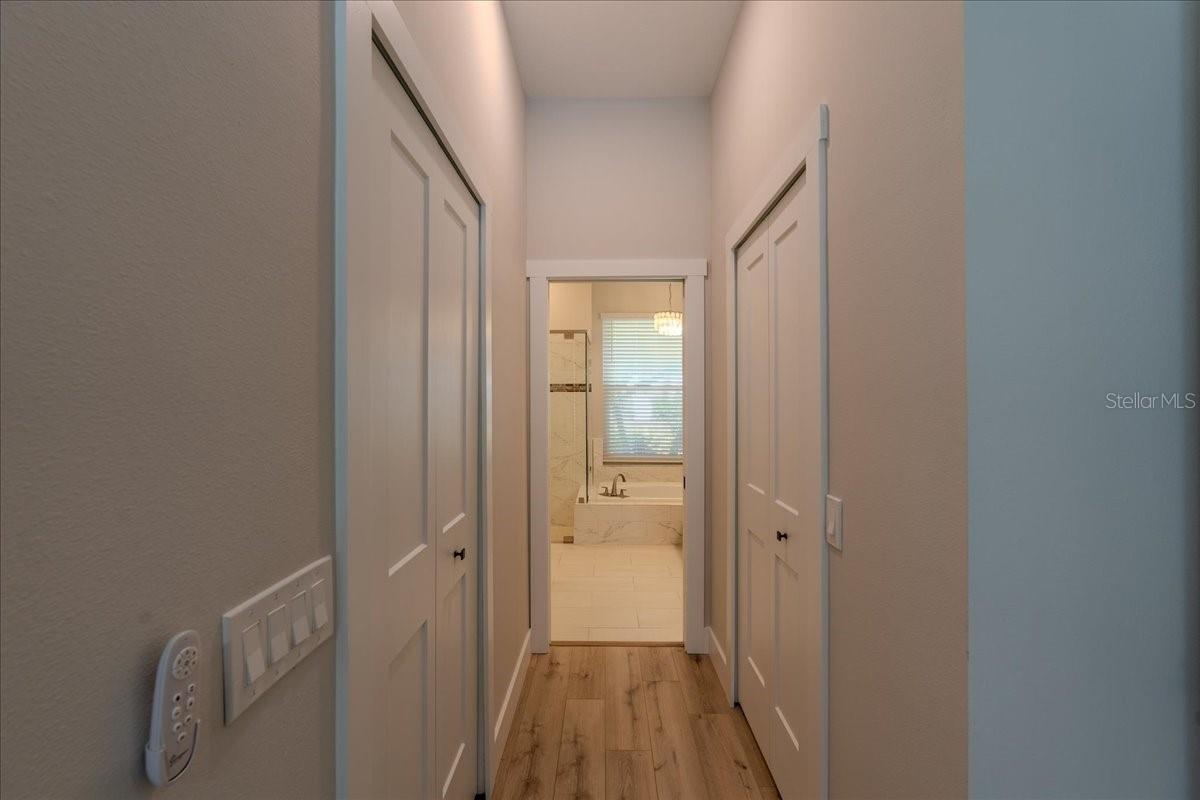 Master Suite Hall with Dual Custom Closets