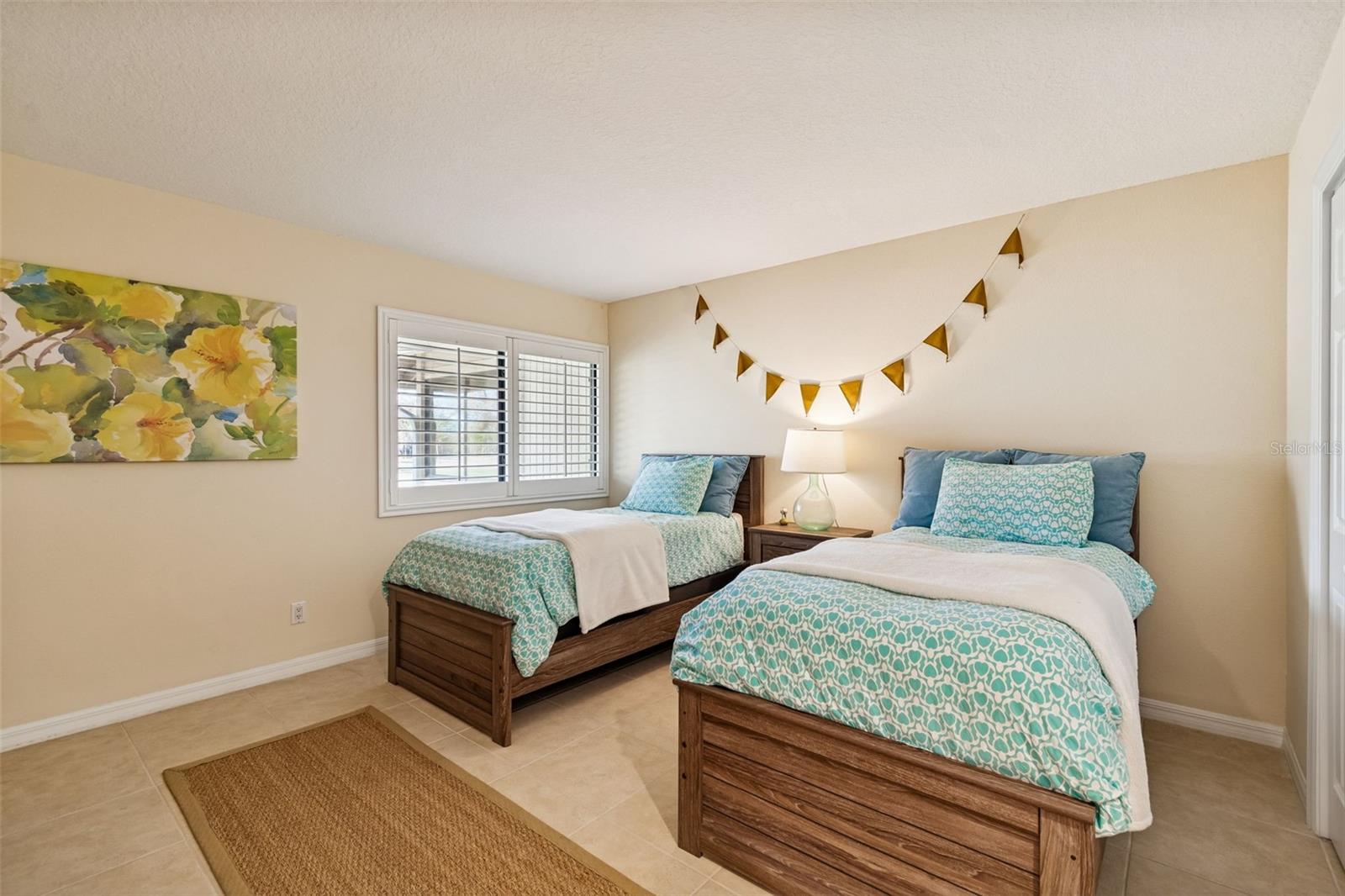 Primary Bedroom - Designed as the primary bedroom, perfect as a guest retreat if desired
