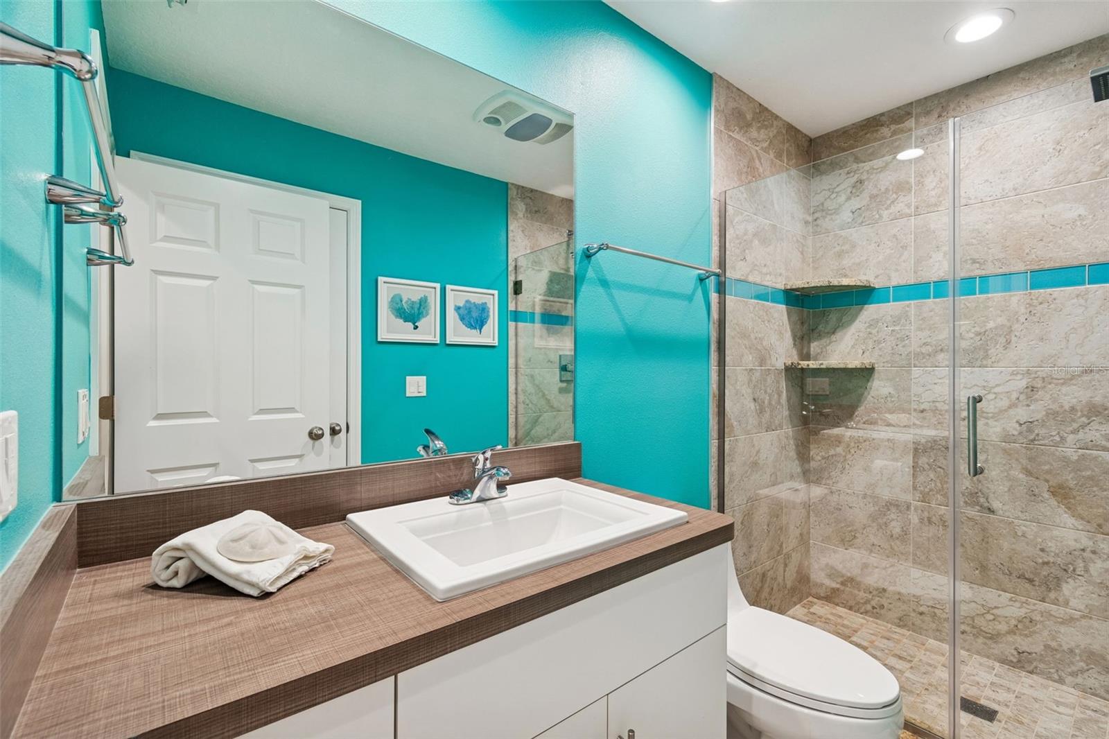 Thoughtfully updated guest bathroom.