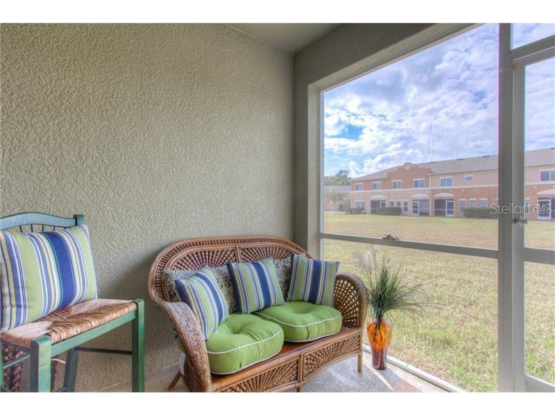 Relaxing Enclosed Screened Patio