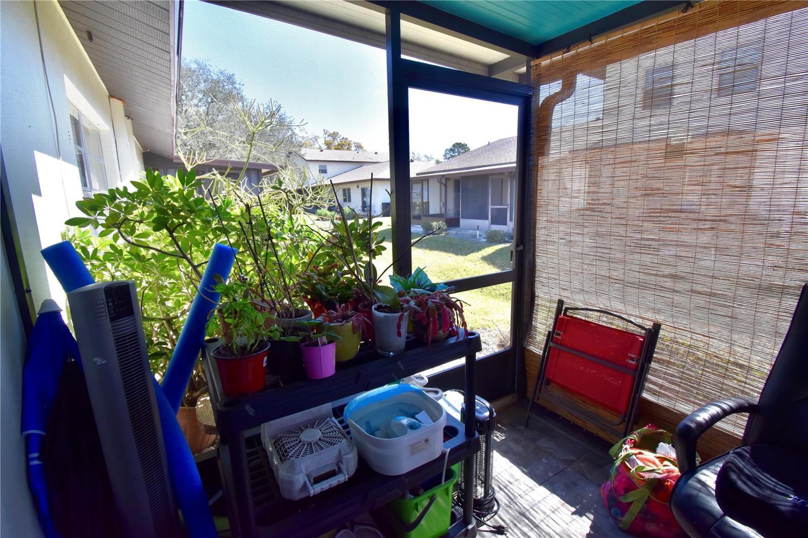 Lanai- door to green space