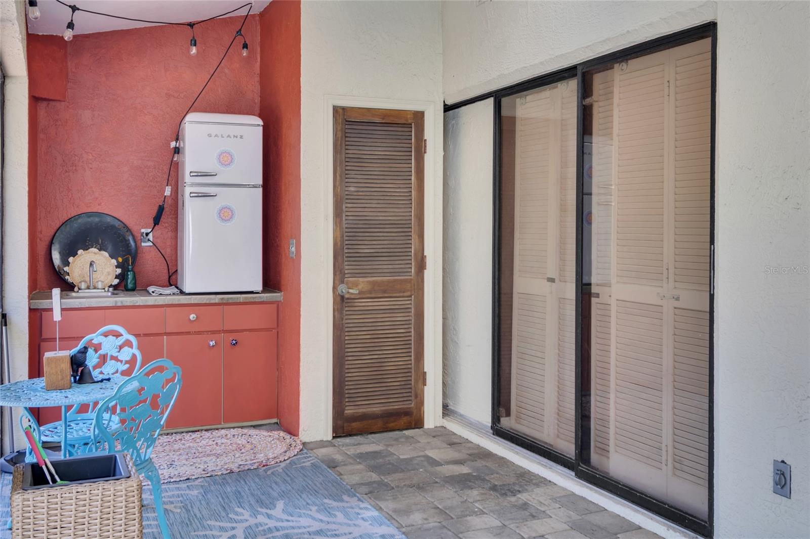 sink, counter and storage space on pool deck