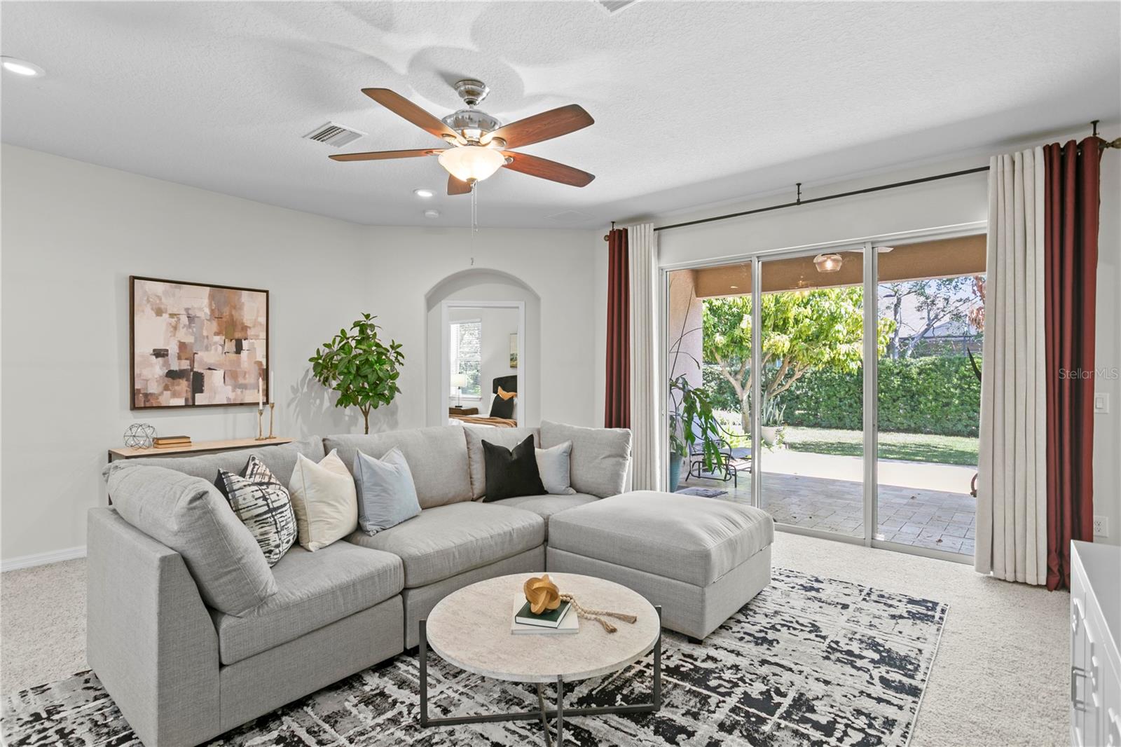 View looking from large family room towards primary bedroom