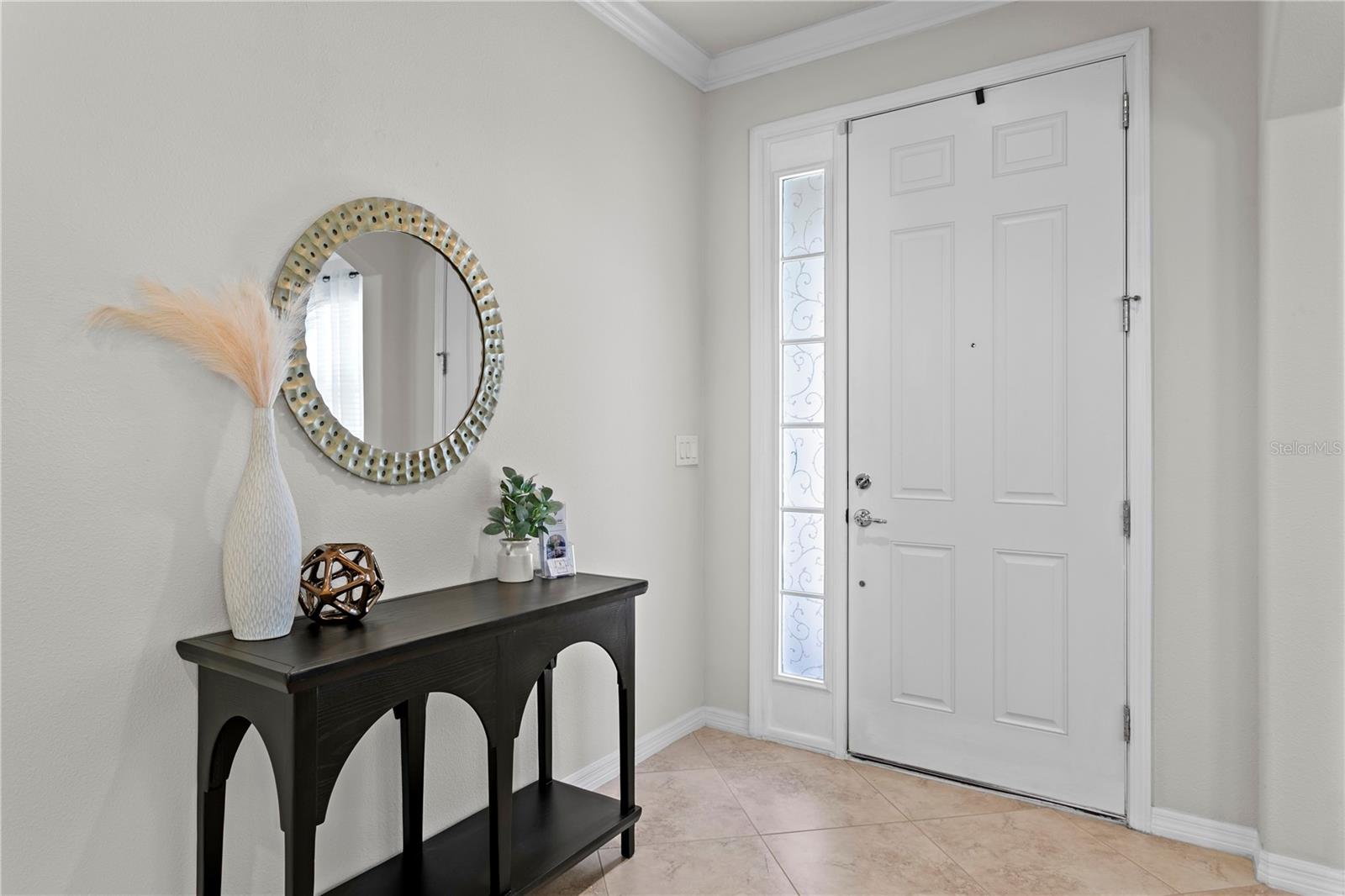 Foyer features ceramic tile floor