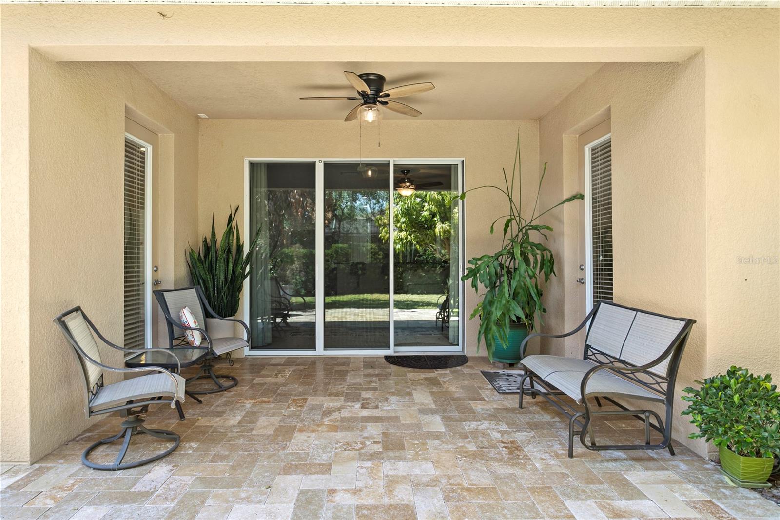 Lanai is accessible from Family Room sliders and Primary Bedroom exterior door