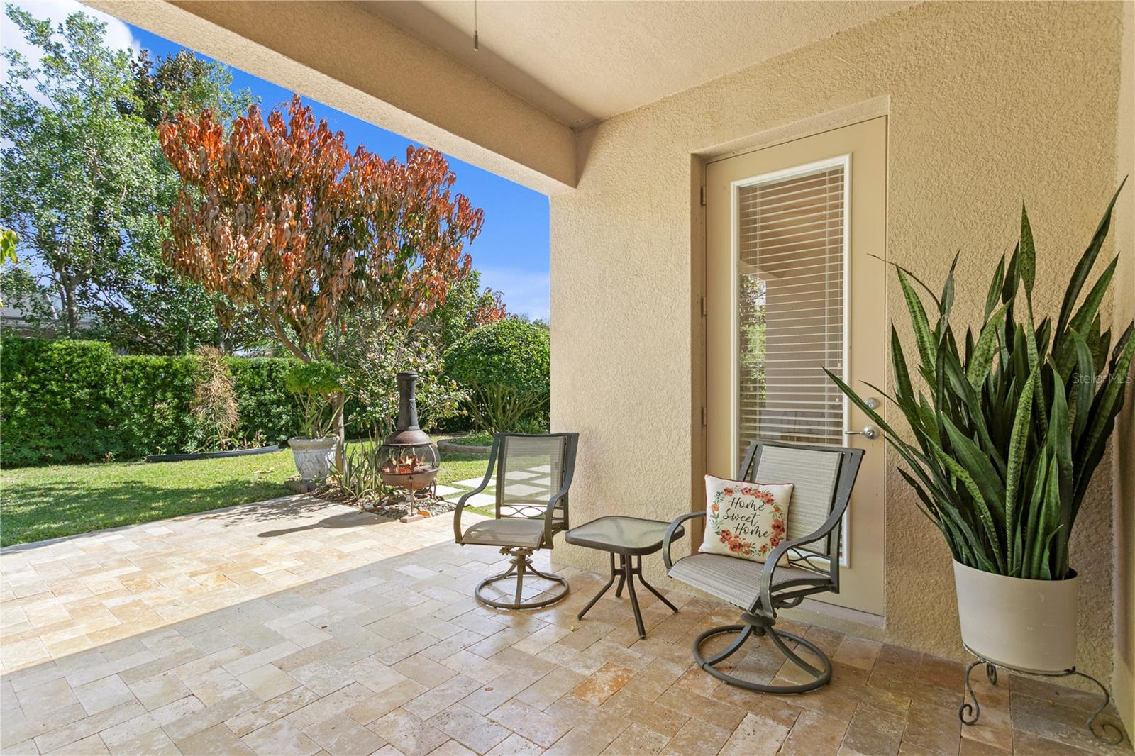 Large covered lanai with pavers