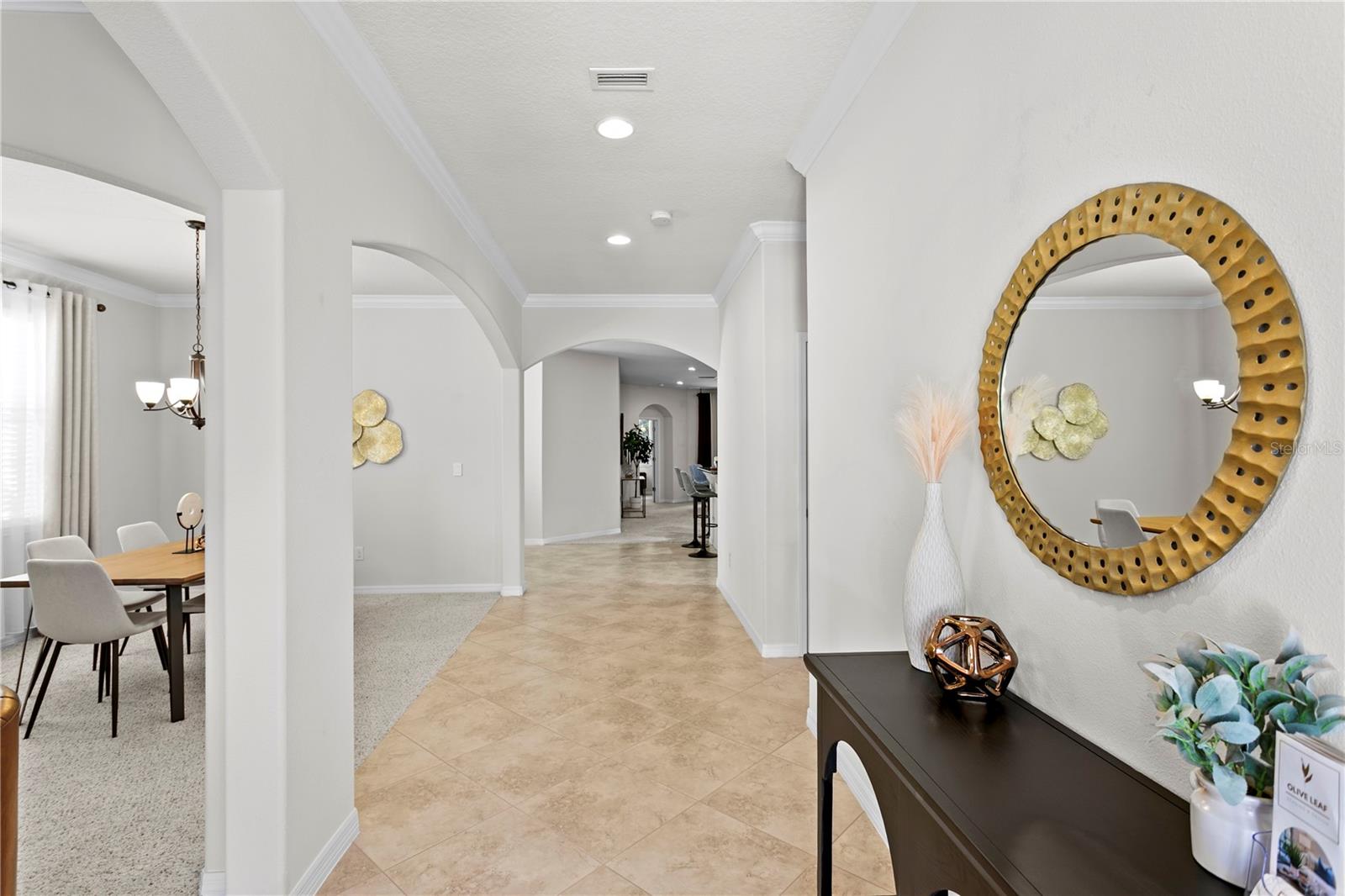 Large foyer with 10ft ceilings welcome you into the home
