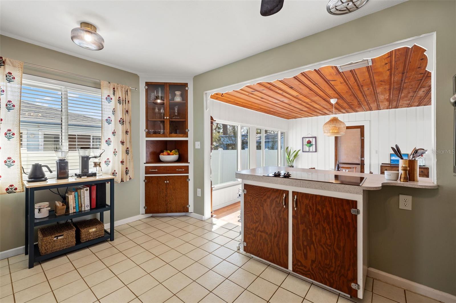 Open-concept connection between the kitchen and dining area makes hosting and everyday meals effortless.