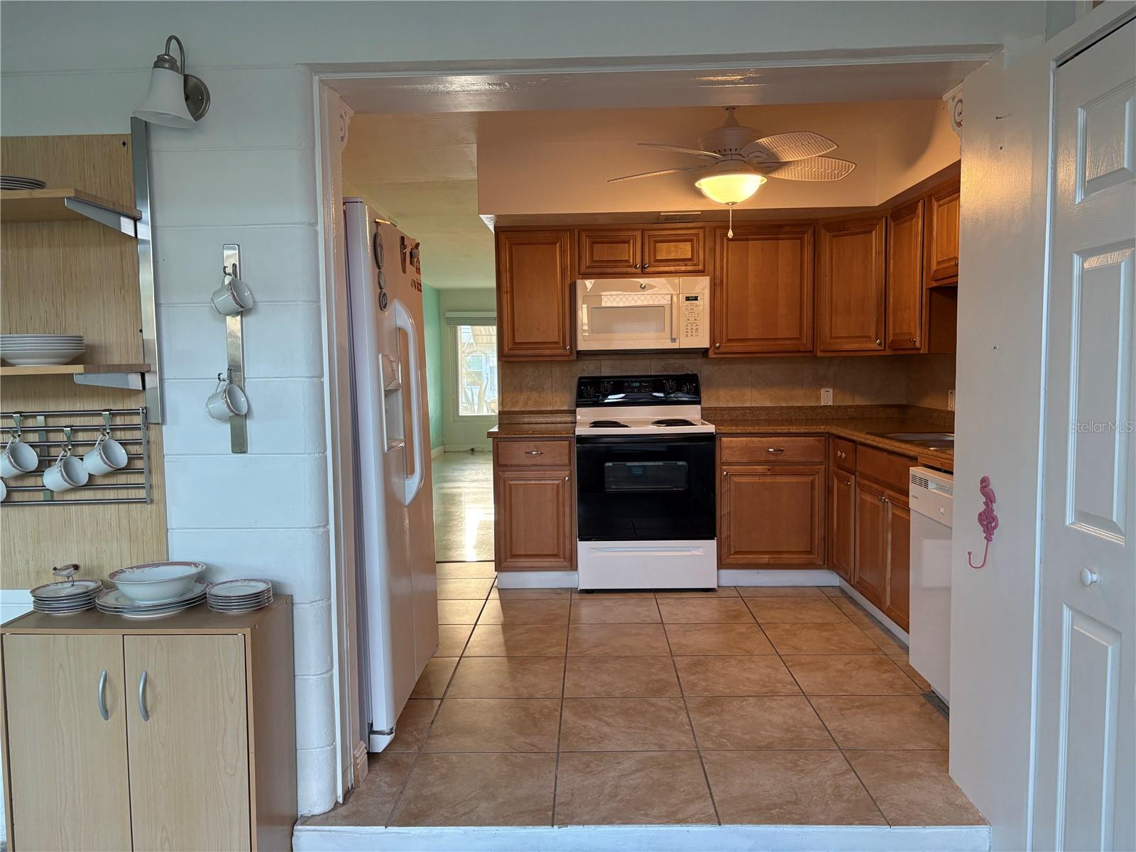 Fully equipped kitchen with plenty of cabinets.