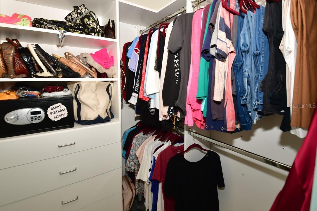 Walk-In closet withbuilt-ins.