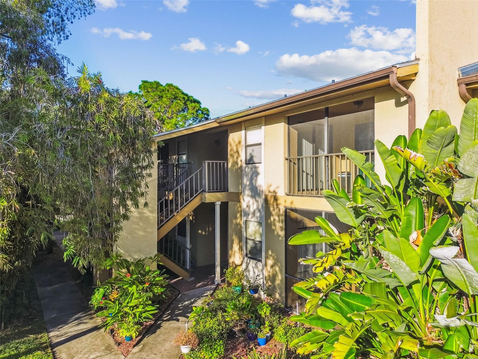 Front of condo building, unit on second floor.