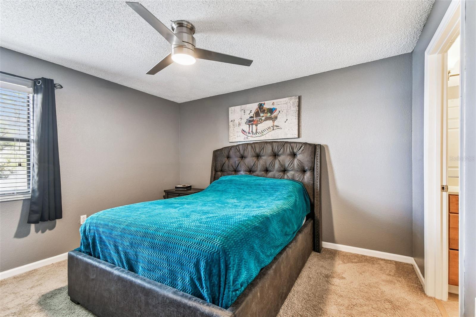 Primary bedroom, on rear of condo.