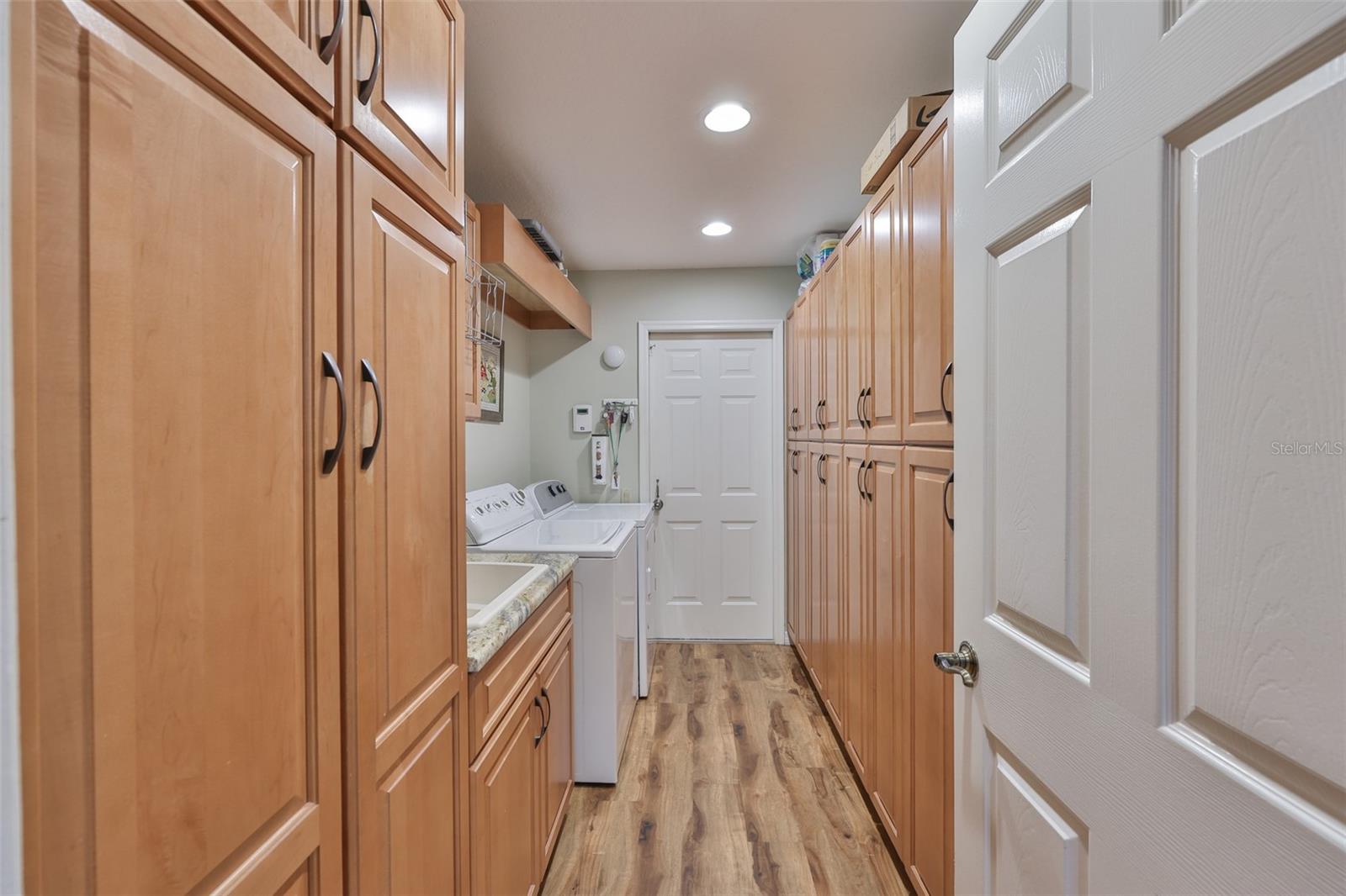 Laundry Room with sink and storage