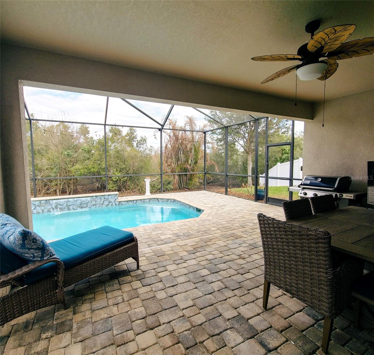 Large covered lanai with pool