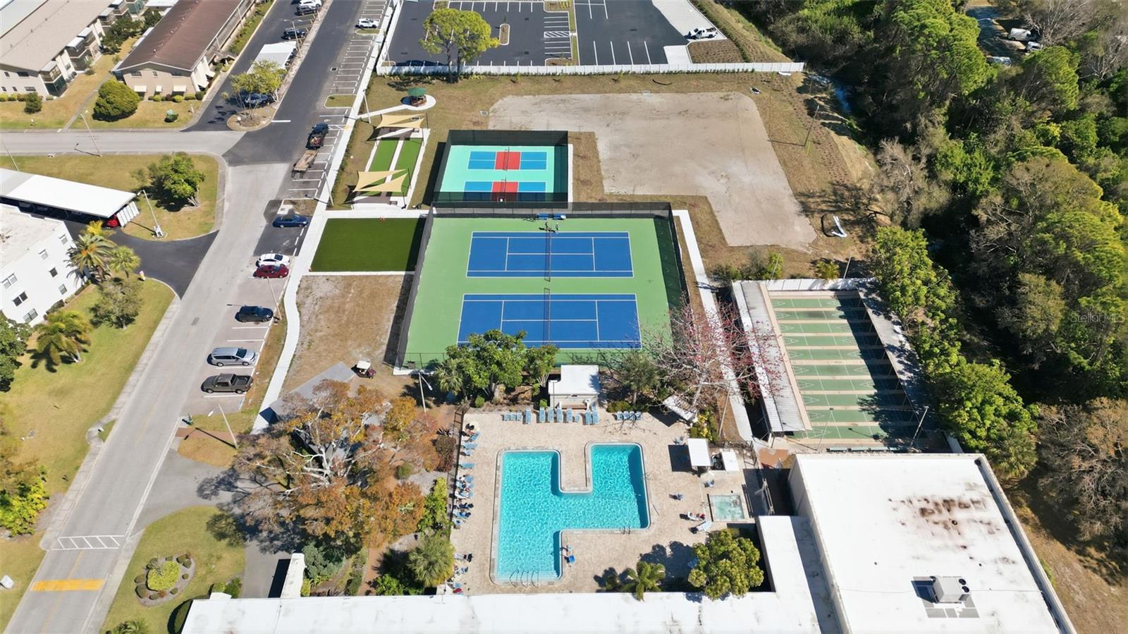 Aerial view of recreation areasAerial shot highlighting pool deck layout