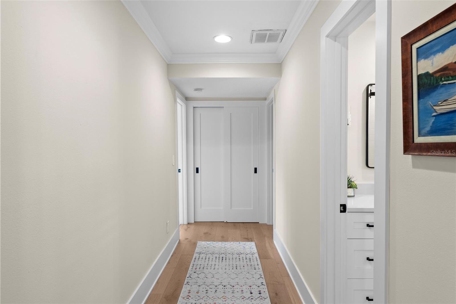 Down the hall find two secondary bedrooms