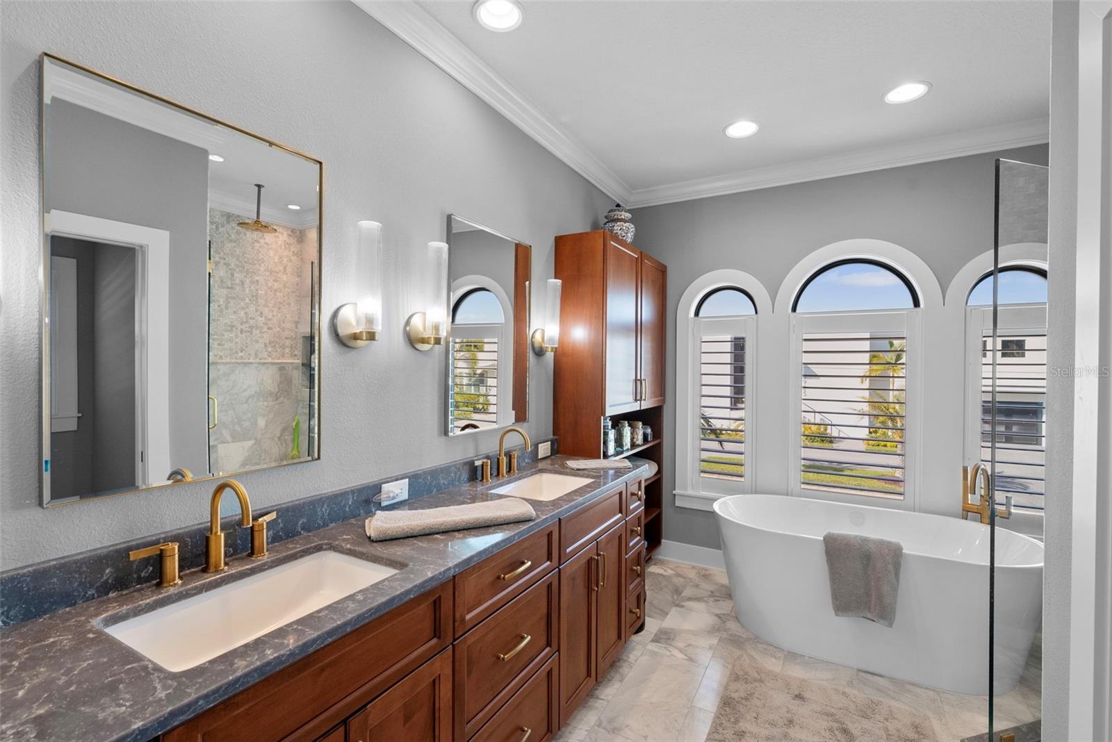 And an updated bath featuring a dual sink vanity