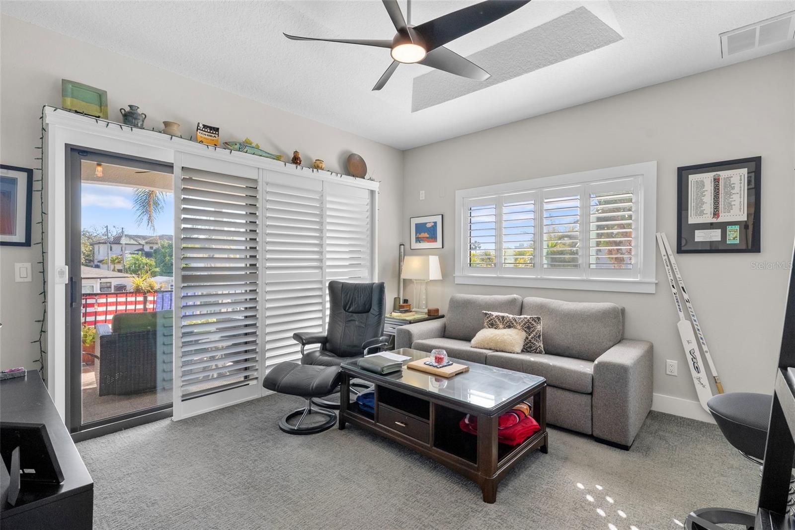 Adjacent to the primary is another bonus room