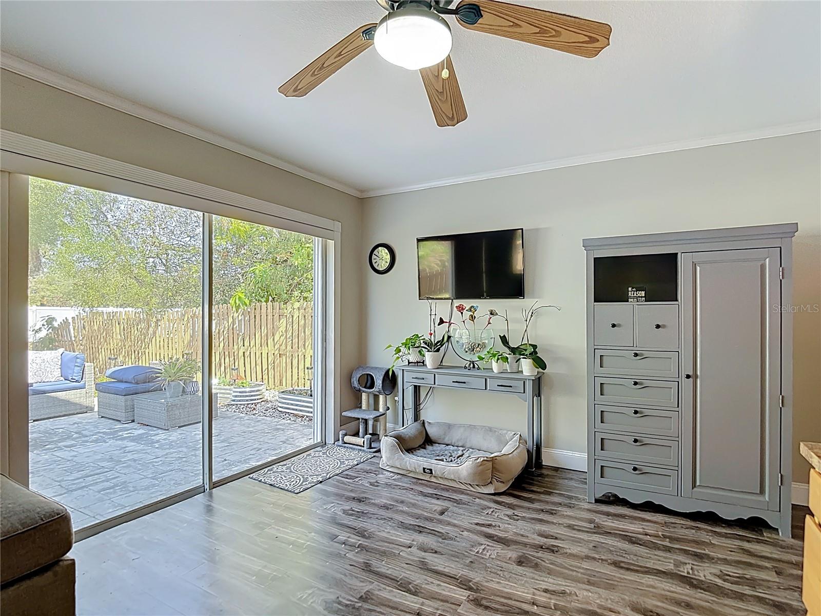 The office is conveniently located off the main living area and offers sliding glass doors leading to the backyard and open patio — ideal for working from home or easily converting into a fourth bedroom.