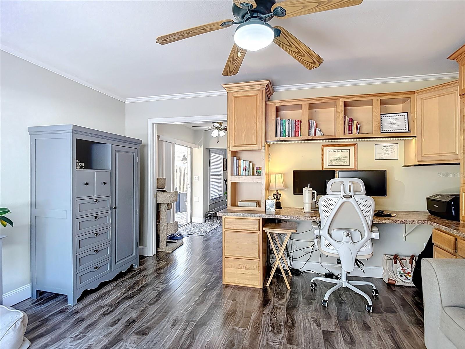 The office is conveniently located off the main living area and offers sliding glass doors leading to the backyard and open patio — ideal for working from home or easily converting into a fourth bedroom.