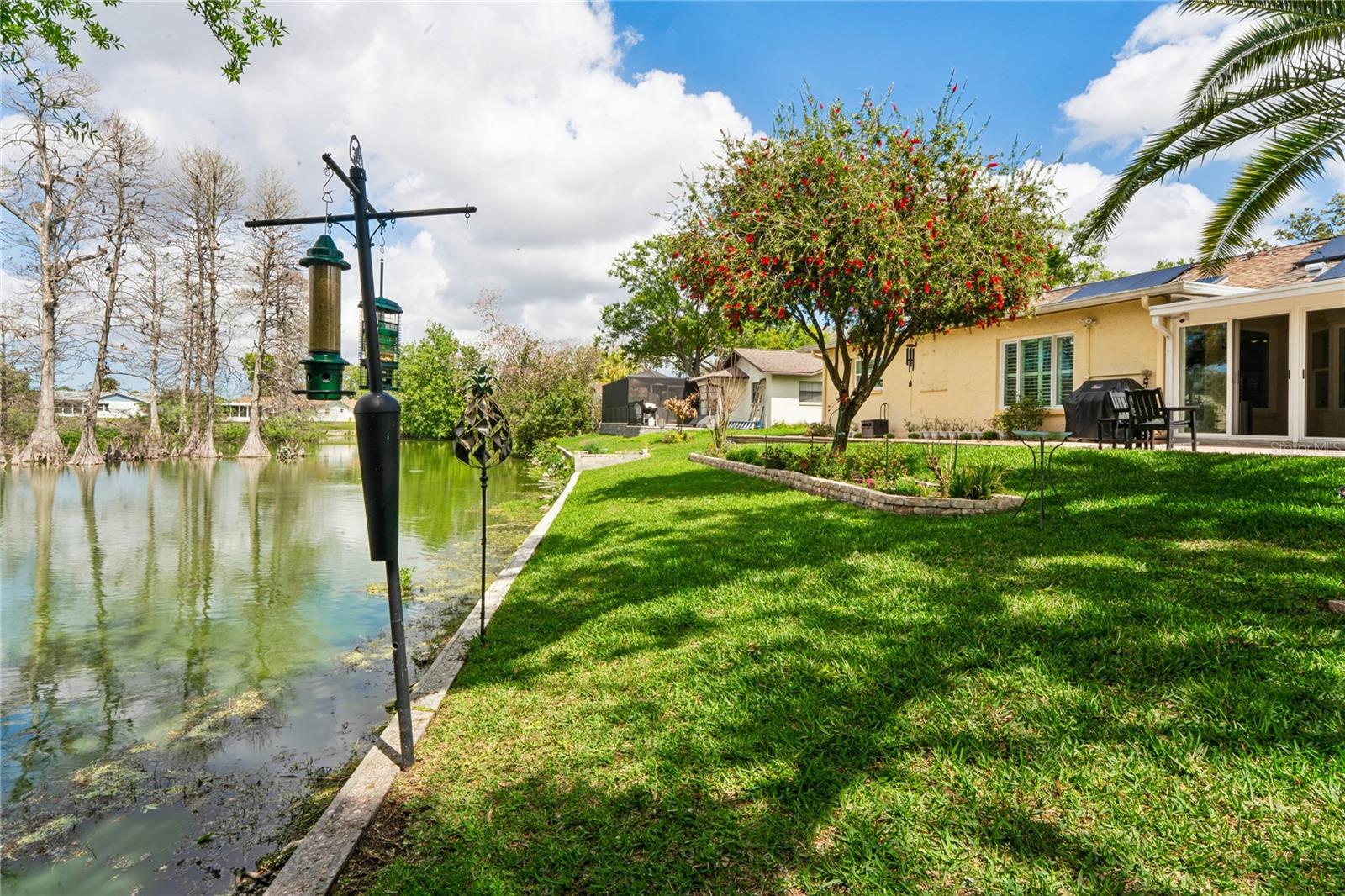 MANICURED YARD/SEAWALL