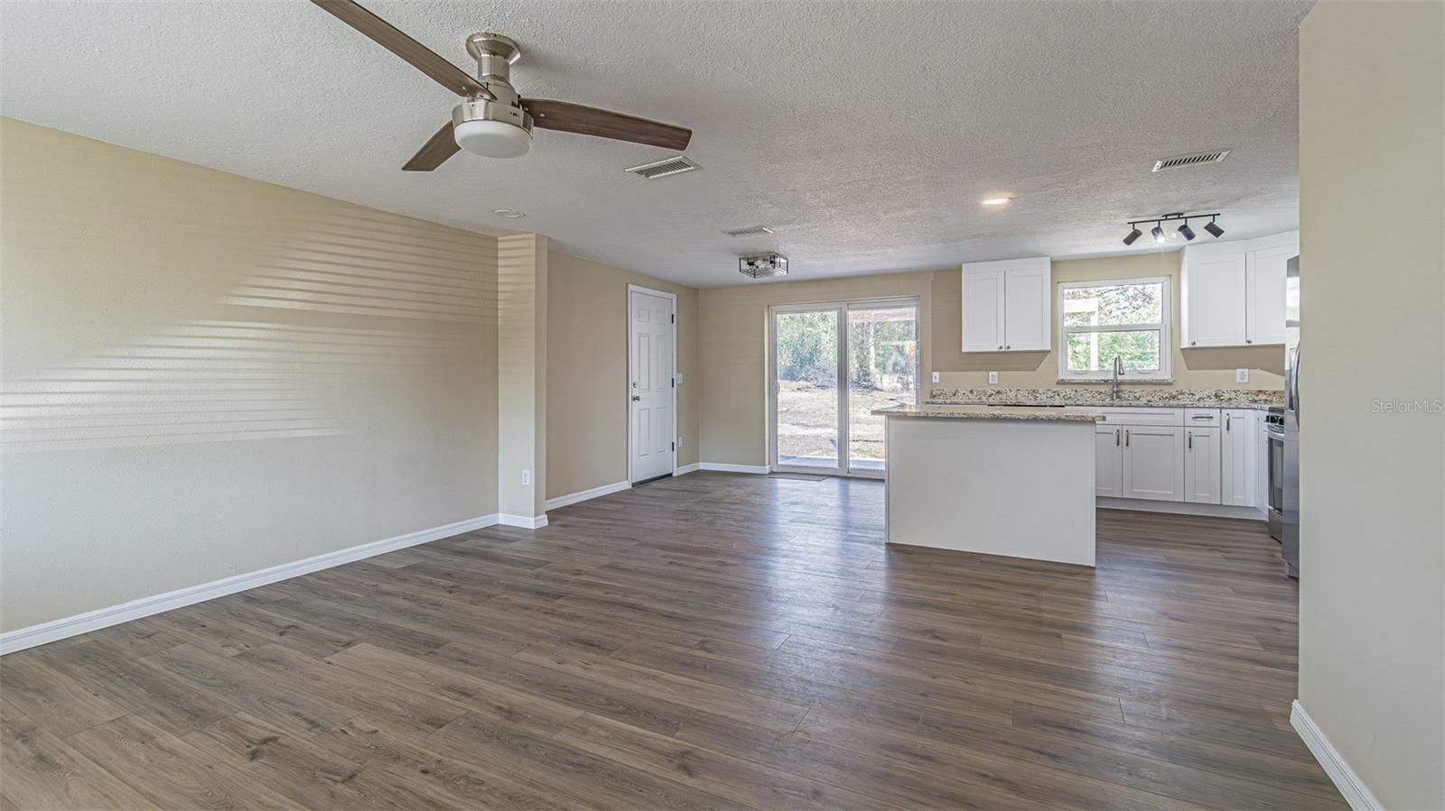Open Kitchen, Dining, Living area