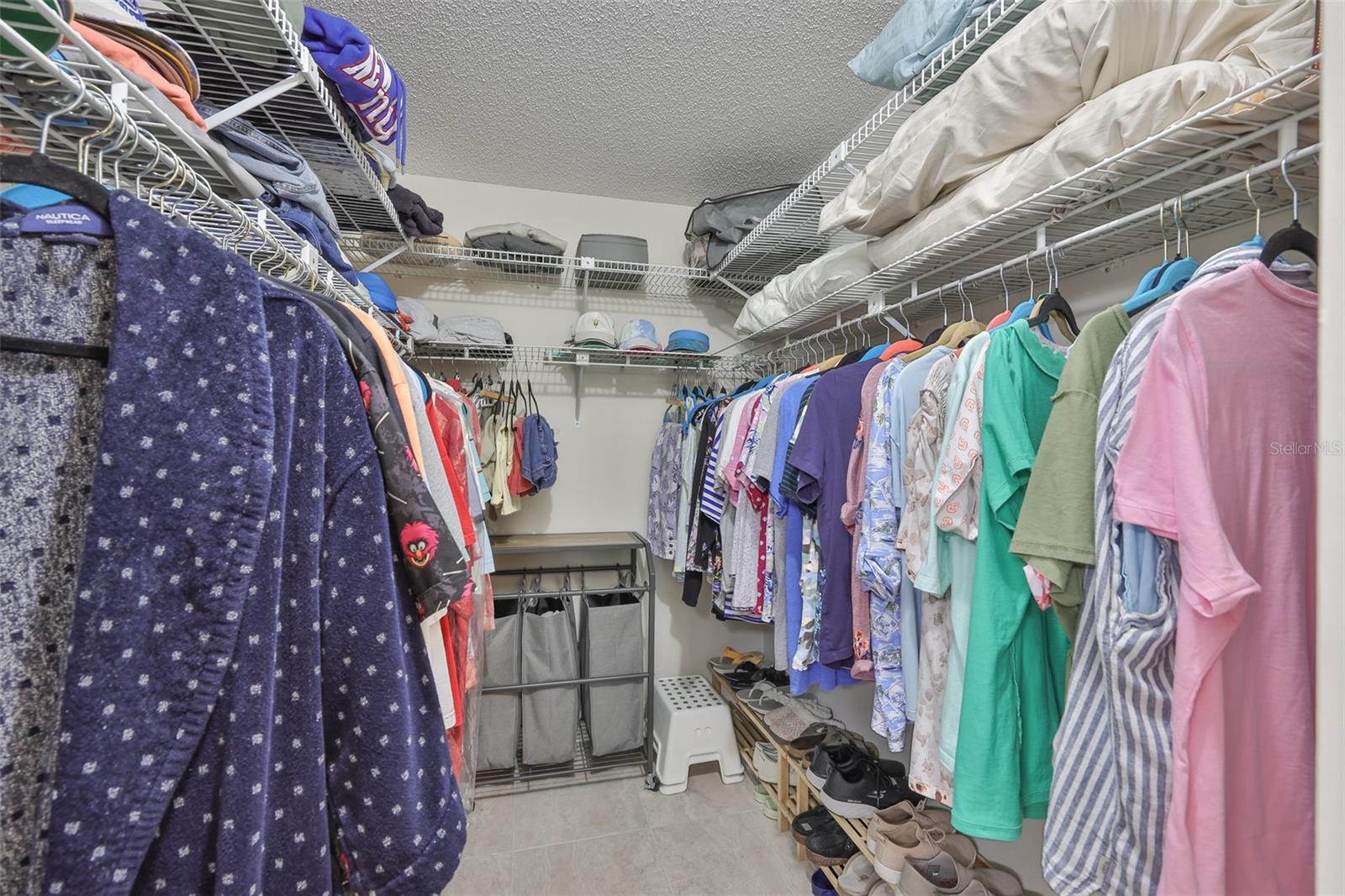 The walk-in closet is deep and extremely large.