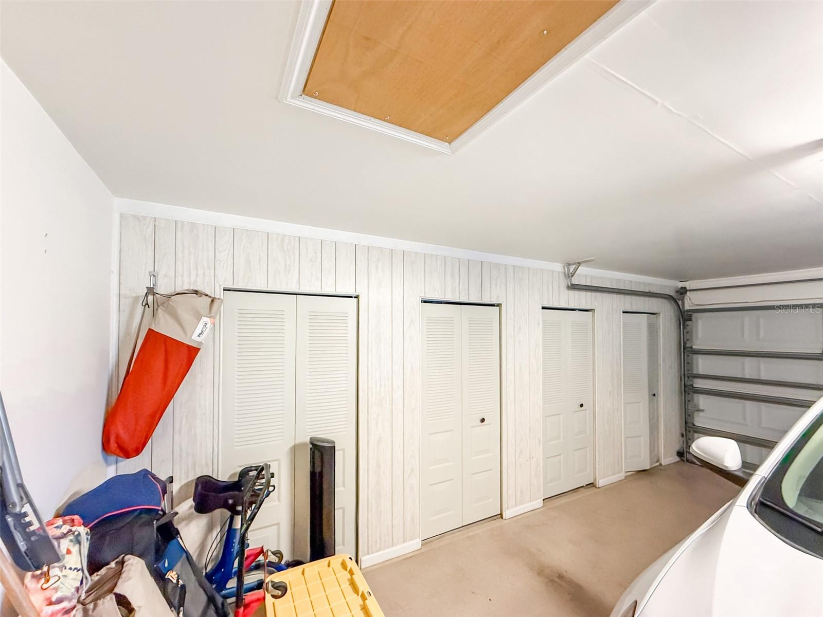 The garage is oversized with epoxy flooring and wall to wall cabinets, perfect for storage and Christmas items.