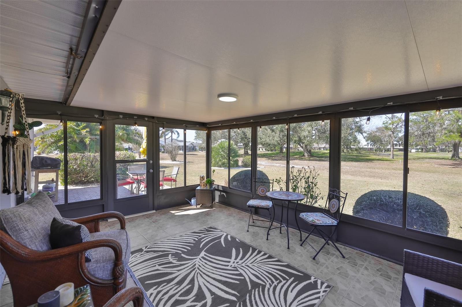 Large ALL SEASON Florida room with an open air patio to enjoy all that Florida has to offer.