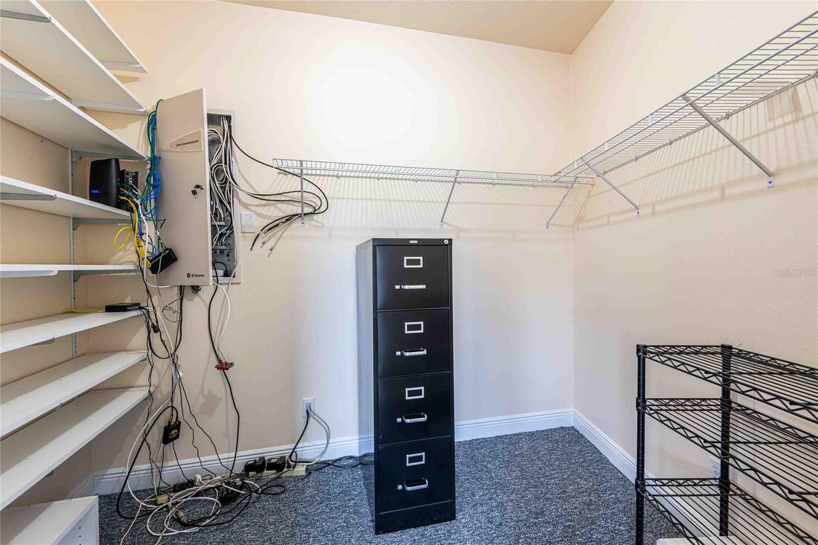 Walk in closet upstairs bedroom