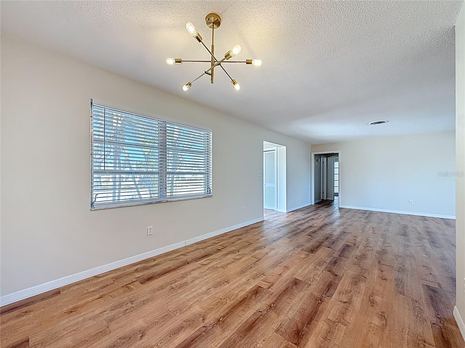 Nice sized dining room with new Sputnik chandelier