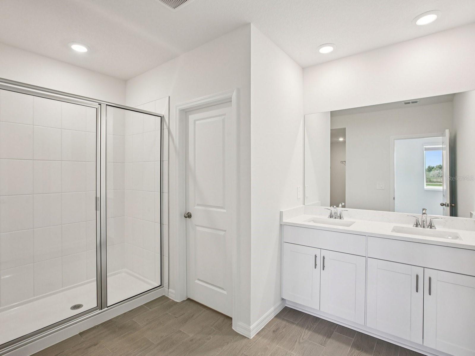 Interior photos are not of the actual home but are photos of the builder home with the same floorplan with similar interior finishes and features.