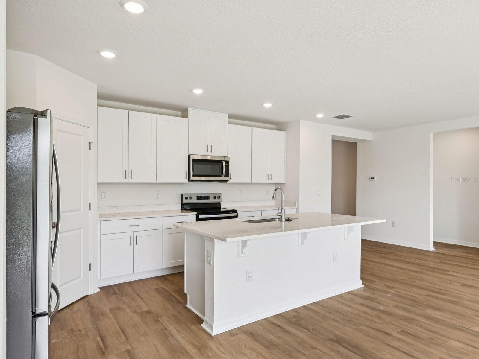 Interior photos are not of the actual home but are photos of the builder home with the same floorplan with similar interior finishes and features.