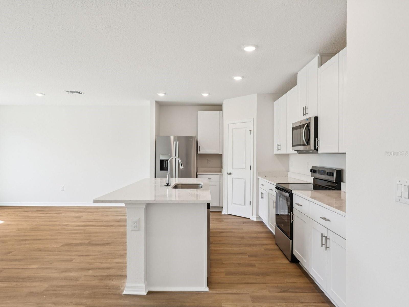 Interior photos are not of the actual home but are photos of the builder home with the same floorplan with similar interior finishes and features.
