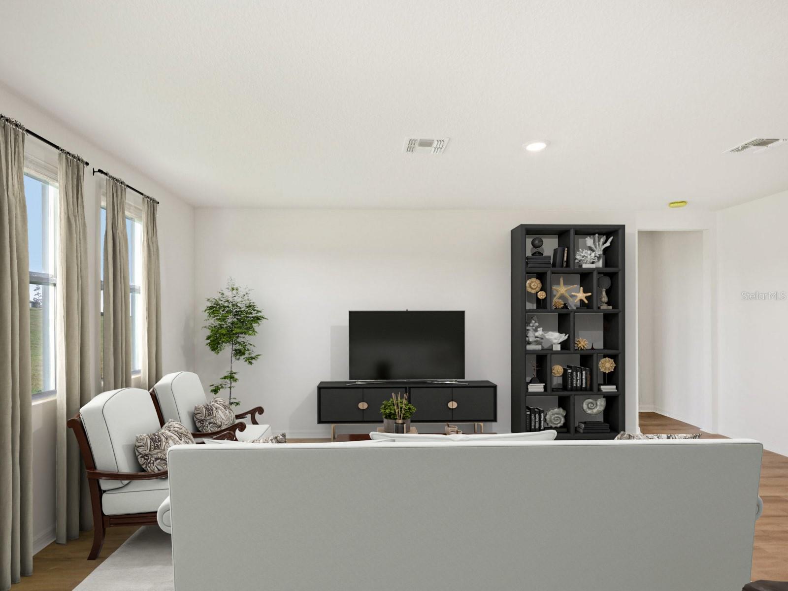 Interior photos are not of the actual home but are photos of the builder home with same floorplan with similar interior finishes and features. Photo uses virtual staging.