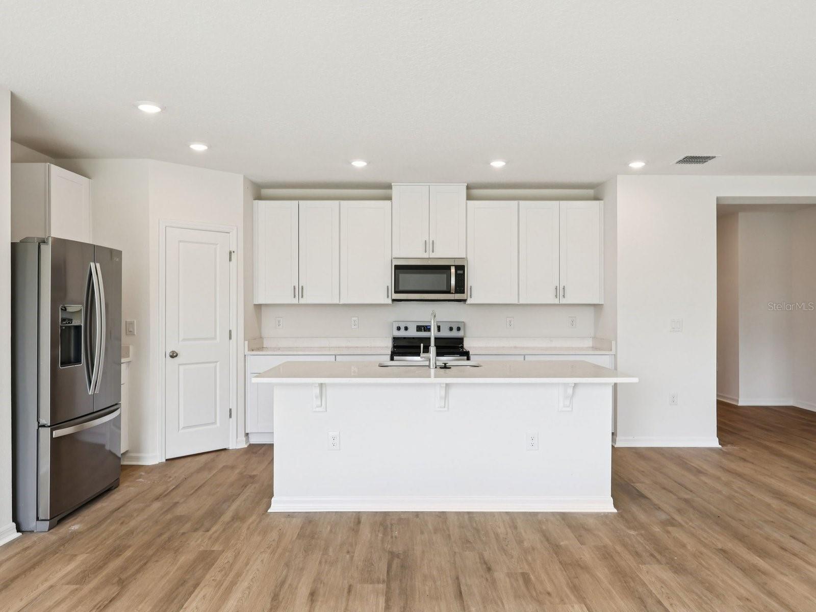 Interior photos are not of the actual home but are photos of the builder home with the same floorplan with similar interior finishes and features.