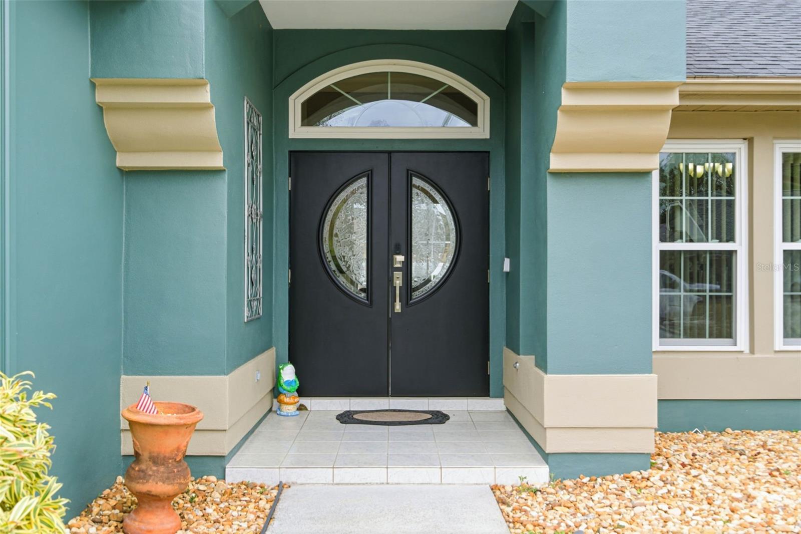 Welcoming main entrance with a clear view into the open floor plan and great room beyond.
