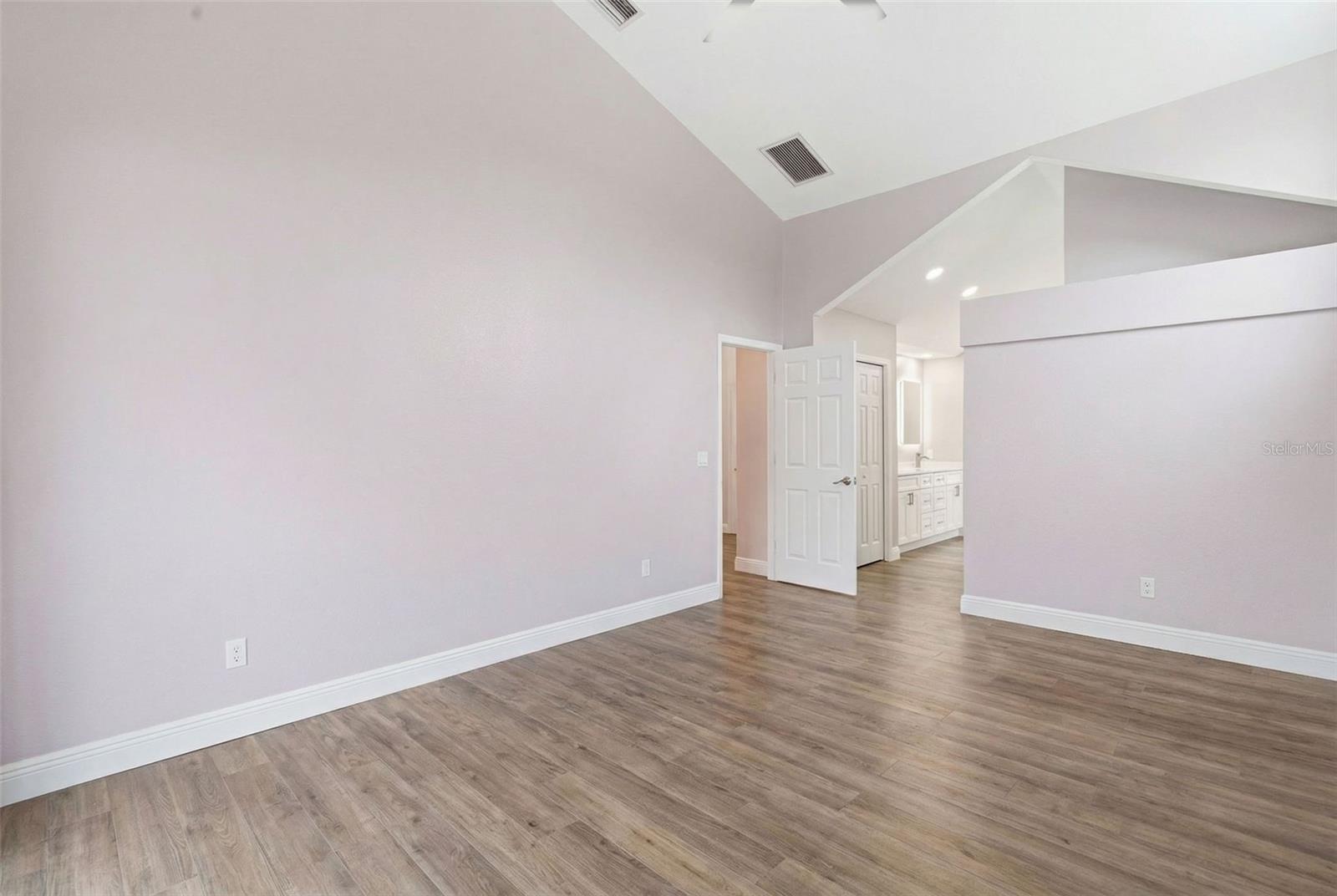 Primary Bedroom with virtual furniture removal for visualization of room size