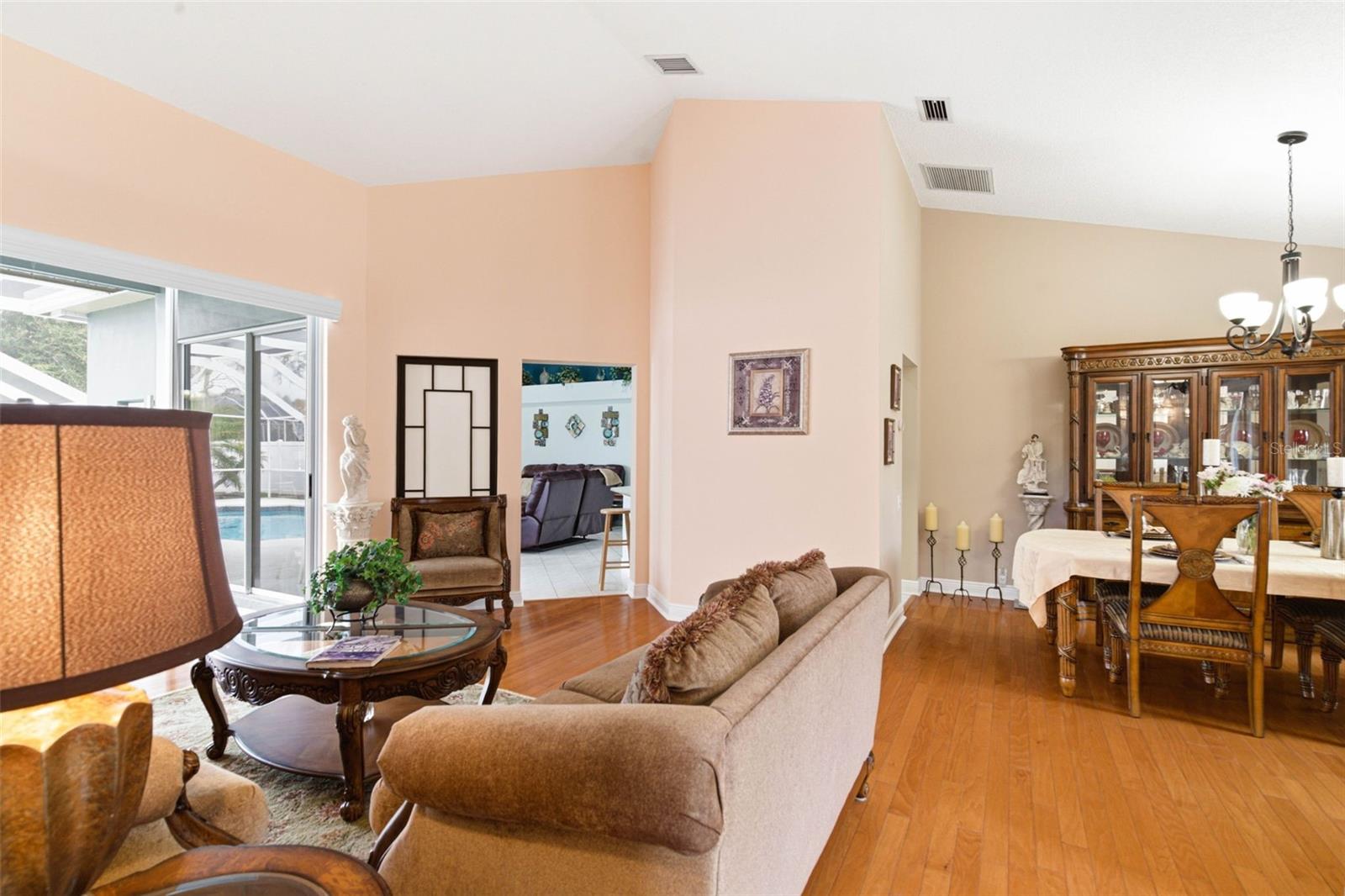 Family Room with open access to the dining room and great room, offering seamless flow throughout the main living areas.