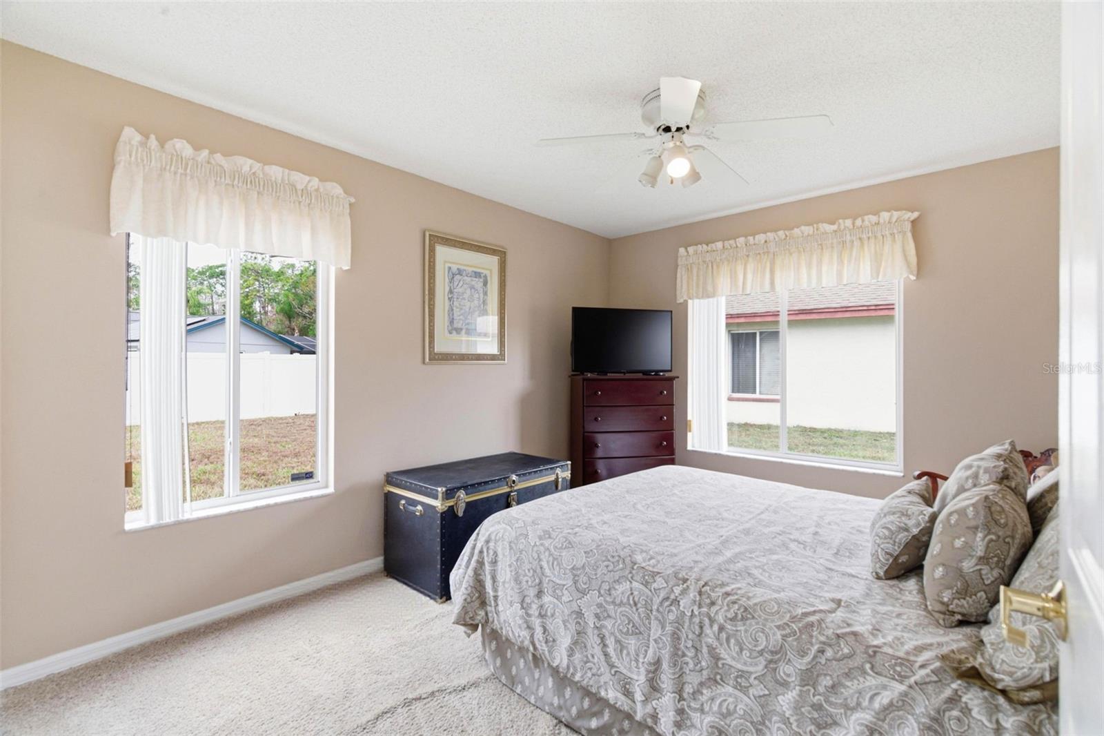 Bedroom 3 - Bright and Inviting Overlooking the backyard.